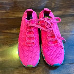 Hot pink NoBulls running shoes